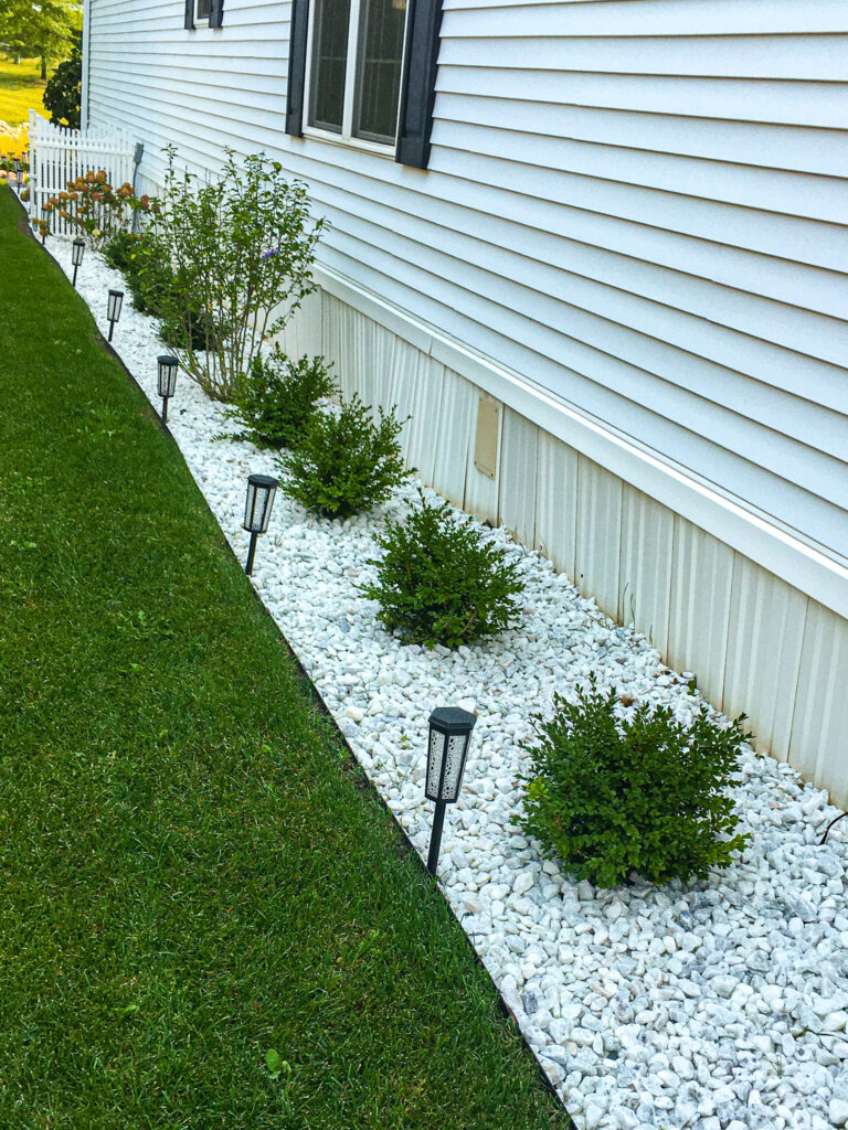 Crystal Lake Stone and Shrub Installation Side Bed