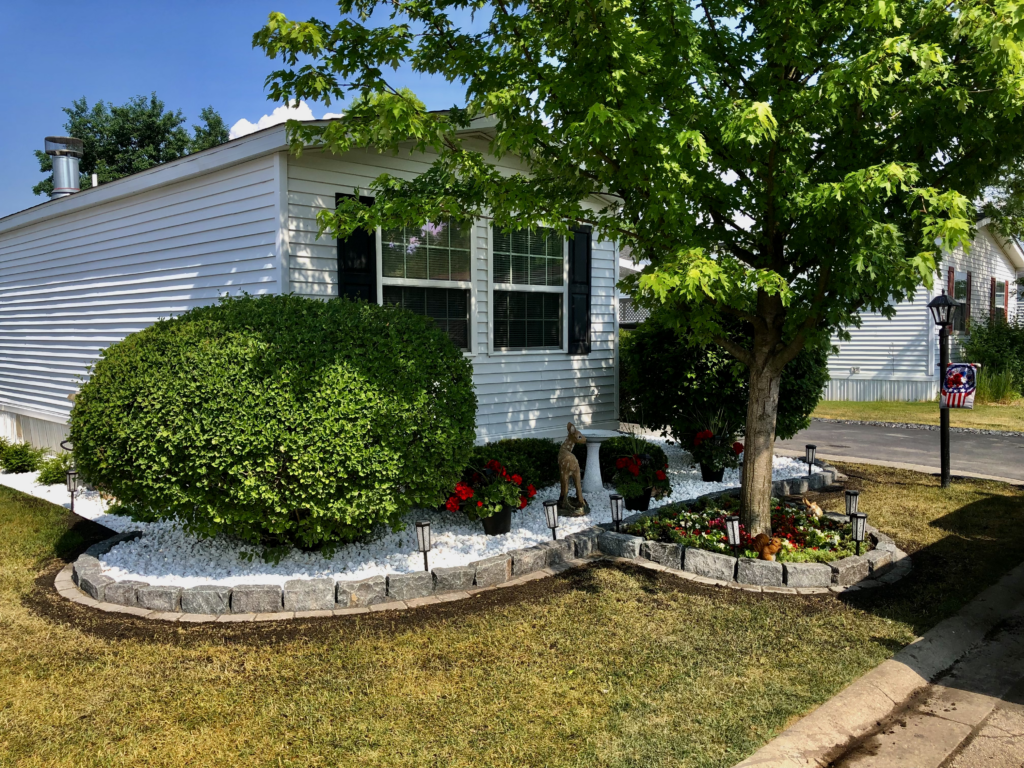 Crystal Lake Stone and Shrub Installation Front Bed